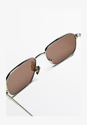 Metal-framed sunglasses with brown tinted lenses, rectangular shape, polished silver accents, and subtle nose pads for comfort.