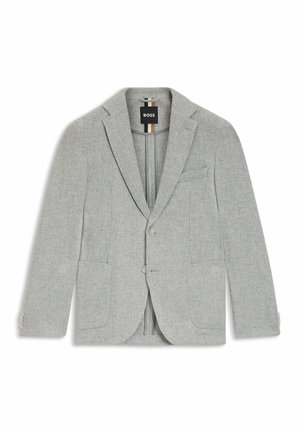 Hellgrauer Blazer aus strukturiertem Stoff. Verfügt über ein Revers, zwei Fronttaschen und zwei Knöpfe. Markenlabel innen sichtbar.