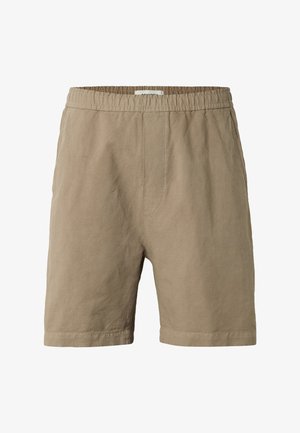 Beżowe szorty z elastycznym pasem, kieszeniami bocznymi i prostym krojem, wykonane z lekkiego materiału.