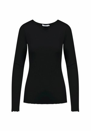 Zwarte, nauwsluitende dames top met lange mouwen, ronde halslijn en licht gerimpelde manchetten.