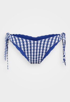 Zili un balti pārbaudītas bikini apakšbikses ar sānu saitēm, trīsstūrveida formu, teksturētu audumu un gludu jostas vietu.