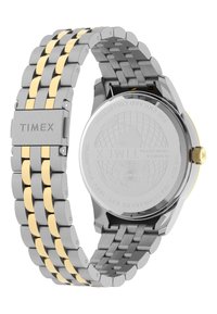 Silver and gold-tone stainless steel watch featuring a link bracelet design, a round case, and a textured back with globe engraving.