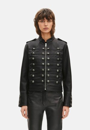 Black leather jacket with military-style front, featuring silver buttons and a high collar. Slim fit with zip closure and detailed cuffs.