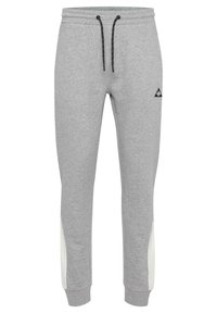 Gray sweatpants with black drawstring, elastic waistband, white side panels, and a small black logo on the front. Soft cotton blend material.