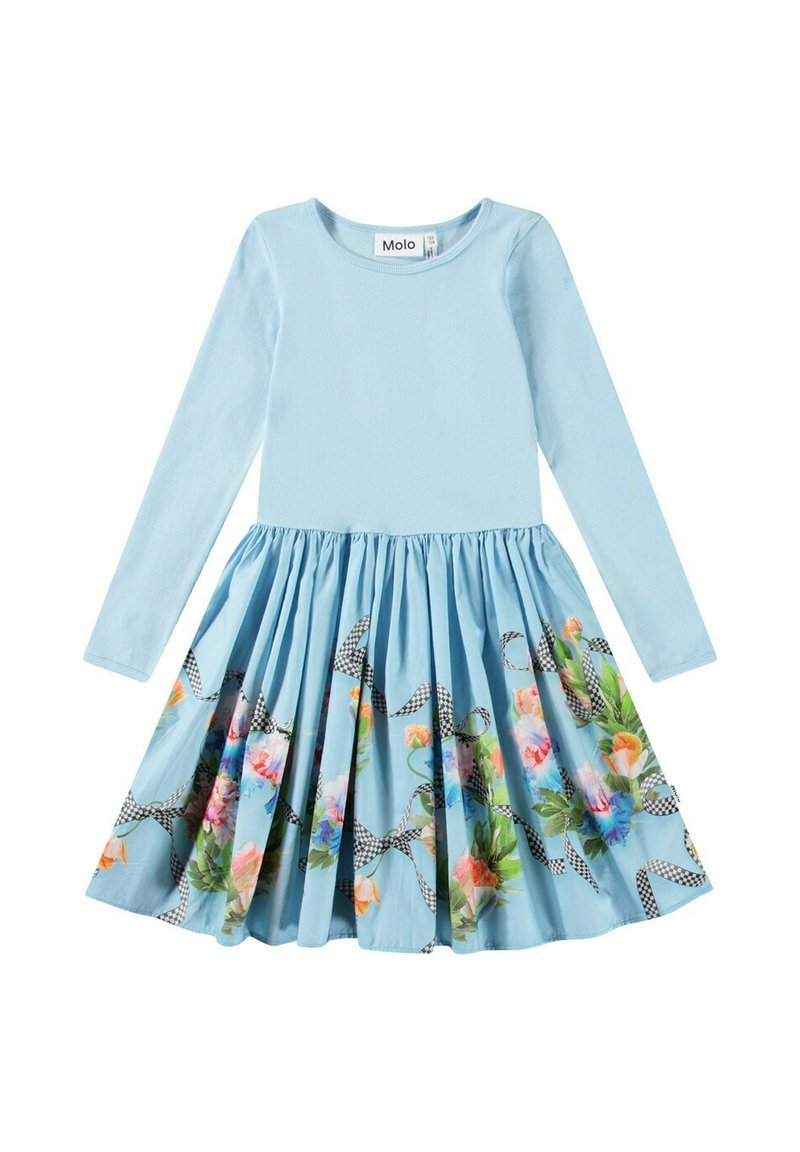 Sininen pitkähihainen mekko, jossa on ribatettu yläosa; kellotettu helma, jossa on kukkakuosi ja ruudulliset nauhaaksentit, valmistettu pehmeästä puuvillakankaasta.