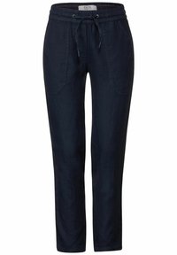 Ciemnoniebieskie lniane spodnie z elastycznym paskiem, bocznymi kieszeniami i luźnym krojem, charakteryzujące się gładką strukturą i zwężającymi się nogawkami.