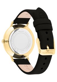 Goldfarbene Edelstahl-Uhr mit schwarzem Lederarmband. Verfügt über eine glatte Oberfläche, strukturierten Kanten und eine gebrandete Schnalle. Wasserdicht.