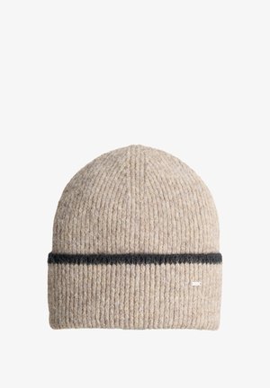 Berretto lavorato a maglia in lana beige chiaro con una striscia orizzontale nera e un piccolo etichetta bianca del marchio. Texture a costine su tutta la superficie.