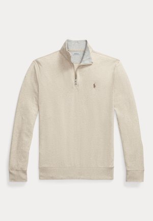 Beżowy pulower z długim rękawem i ćwiartkowym zamkiem błyskawicznym oraz małym logo polo na lewej piersi.