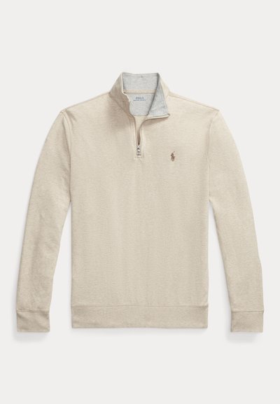 Sudadera beige con cremallera hasta el cuarto, mangas largas y un pequeño logo de jugador de polo en el lado izquierdo del pecho.