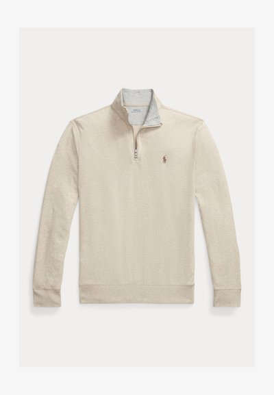 Sudadera beige con cremallera hasta el cuarto, mangas largas y un pequeño logo de jugador de polo en el lado izquierdo del pecho.