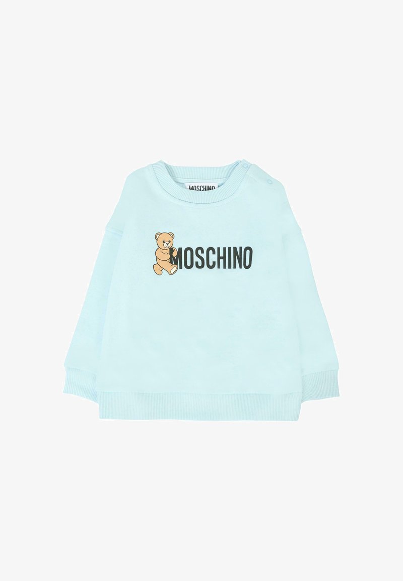 Felpa azzurra chiara con grafica di orsetto e testo "MOSCHINO". Realizzata in materiale morbido, con polsini e colletto a costine.