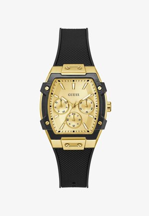 Goldfarbene Uhr mit quadratischem Ziffernblatt, schwarzem Gummiband, drei Unterzifferblättern und strukturierten Akzenten um das Gehäuse. Enthält das Markenlogo.