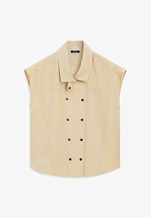 Beige mouwloze vest met een dubbelrijig ontwerp en zwarte drukknopen, met een brede kraag en gestructureerde naden.