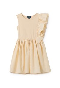 Abito senza maniche di un beige chiaro con un corpetto a coste, gonna svasata e un accento volant su una spalla. 95% cotone, 5% elastan.