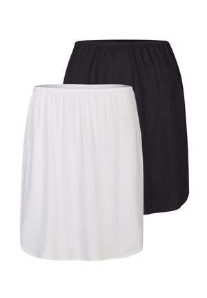 Two half-slip skirts, one white and one black, with elastic waistbands, displayed on a plain background.