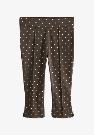 Brune, korte bukser med hvide prikker, lige ben og bred linning.