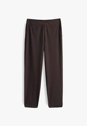 Braune, leichte Hose mit einem elastischen Bund, zwei Seitentaschen und geradem Schnitt, hergestellt aus einem glatten, dehnbaren Stoff.