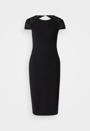 Black dress with short lace cap sleeves, fitted silhouette, knee-length with a side slit, made from smooth fabric, featuring a round neck.