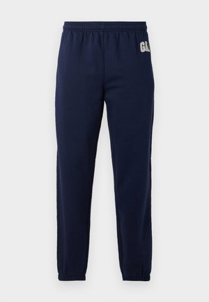 Navy blue elastic waist sweatpants with elastic cuffs and a small white logo on the upper left side.