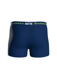 Bóxer para hombres en color azul marino con una cinturilla de logo "Seahawks" en verde y blanco que presenta un emblema de ave, fabricado con un material suave y elástico.