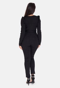Elara Tuta jumpsuit - schwarz