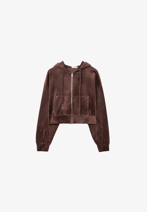 Brauner, cropped Hoodie mit Kapuze, Reißverschluss, vorderen Kängurutaschen und gerippten Bündchen. Hergestellt aus weichem Stoff mit glatter Textur.