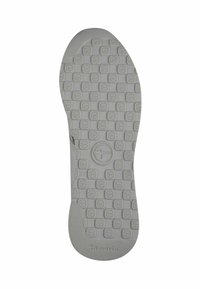 Sole di scarpa in gomma grigia chiara con un motivo esagonale texture, dotata di un logo circolare e del nome del marchio "Tamaris" vicino al tallone.