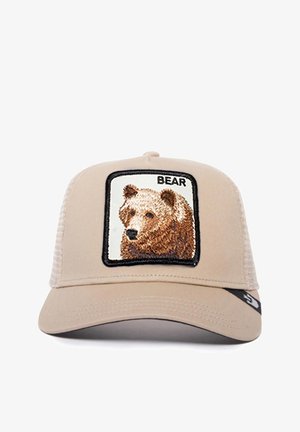 Gorra de béisbol beige con parte trasera de malla, que presenta una imagen de un oso bordada en un parche cuadrado. Contorno negro con el texto "OSO" sobre la ilustración.