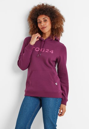 Purple hooded sweatshirt with a front pocket and the text "TOG24" in light pink. Fabric appears soft with ribbed cuffs and hem.