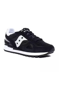 Scarpe sportive in bianco e nero con una tomaia in suede e mesh, colletto imbottito e suola in gomma. Presenta tre dettagli circolari sul lato.