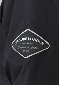 CLOSURE London - Kurtka zimowa