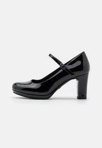 Svart lackläder Mary Jane-sko med en medelhög chunky klack och ett justerbart band med en liten spänne.