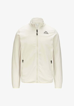 Giacca in pile bianca con colletto alto, zip completa, tasche laterali e logo Kappa nero sul petto. Texture liscia e design aderente.