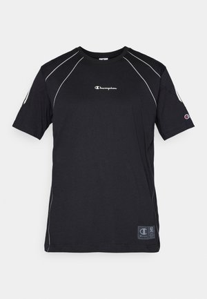 Zwarte katoenen T-shirt met korte mouwen, voorzien van witte contrasterende stiksels en een klein Champion-logo op de voorkant. Flexibel, casual ontwerp.