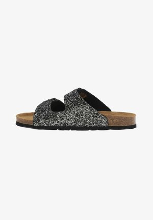 Svarta och silverglittriga slide-sandaler med två breda remmar och en texturerad korkfotbädd, utrustade med en platt gummisula och öppen design.