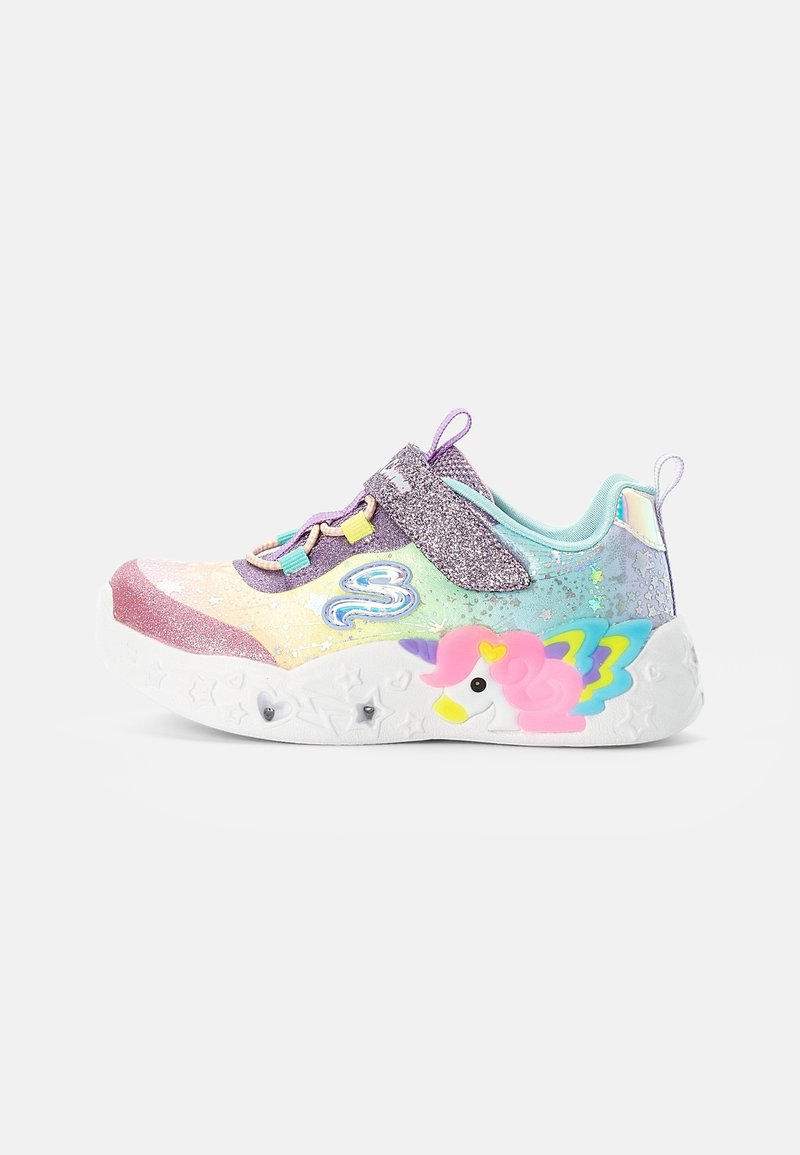 Multicolored youth sneaker with a glittery fabric, featuring a unicorn design on the side, elastic laces, and a cushioned white sole.