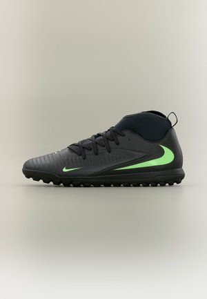 Chaussure de sport montante noire avec logos Swoosh vert néon, lacets noirs et semelle texturée sur fond gris uni.