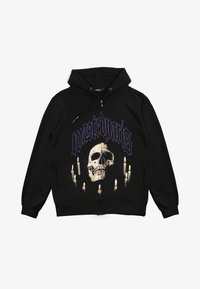 Schwarze Zip-Hoodie mit einem großen Schädel-Graphic in Weiß und Lila, flankiert von brennenden Kerzen. Aus einem weichen Stoff gefertigt. Normale Passform.