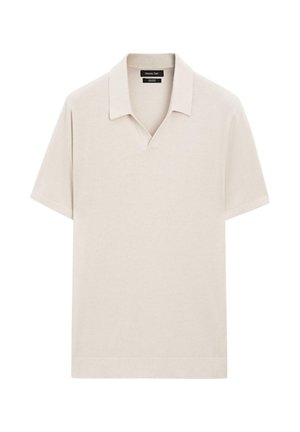 Polo a maniche corte beige con colletto morbido e scollatura a V, realizzato in 100% cotone, presentato su uno sfondo bianco semplice.