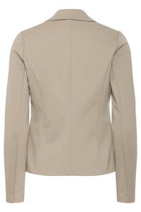 Béžové prispôsobené sako s dlhými rukávmi, detailmi švov a štruktúrovaným zadným golierom.