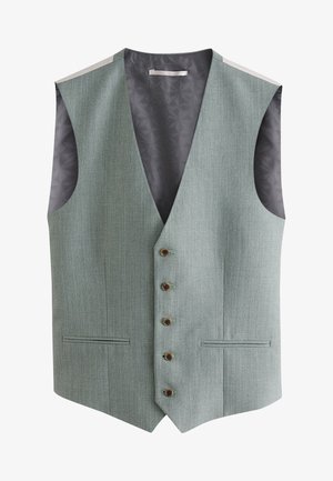 Világoszöld, texturált mellény V-nyakkal, öt barna gombbal, két oldalzsebbel és sötét mintás béléssel. Ujjatlan.