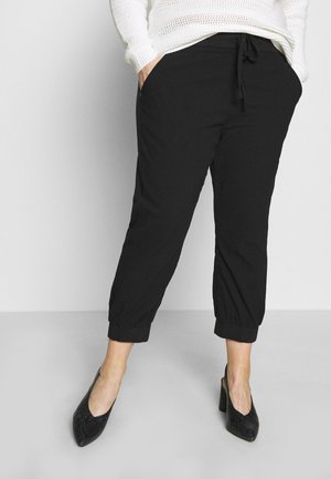 CAPRI - Tracksuit bottoms - black deep