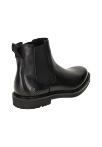 Svarta skinn Chelsea-stövlar med elastiska sidodelar, rund tå och låg blockklack. Inkluderar en dragflik bak för enkel påtagning.