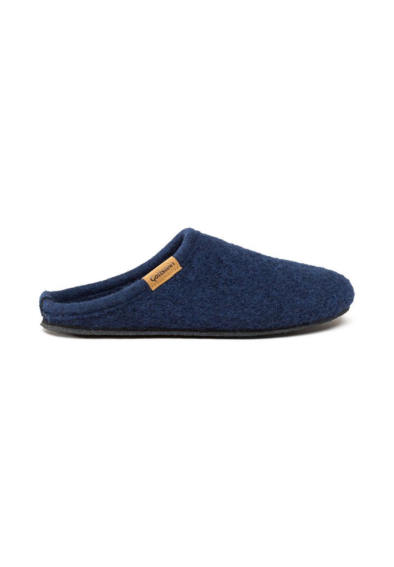 Pantofole in lana blu navy, senza lacci, con suola nera e piccolo tag beige sul lato, su sfondo bianco.