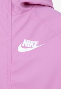 Nike Sportswear RAIN UNISEX - Αδιάβροχο μπουφάν - magic flamingo