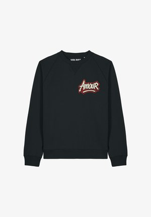 Zwarte sweatshirt met een v-hals en raglanmouwen, met een geborduurd "Amour" in rood en wit. Zachte stof met een gladde textuur.