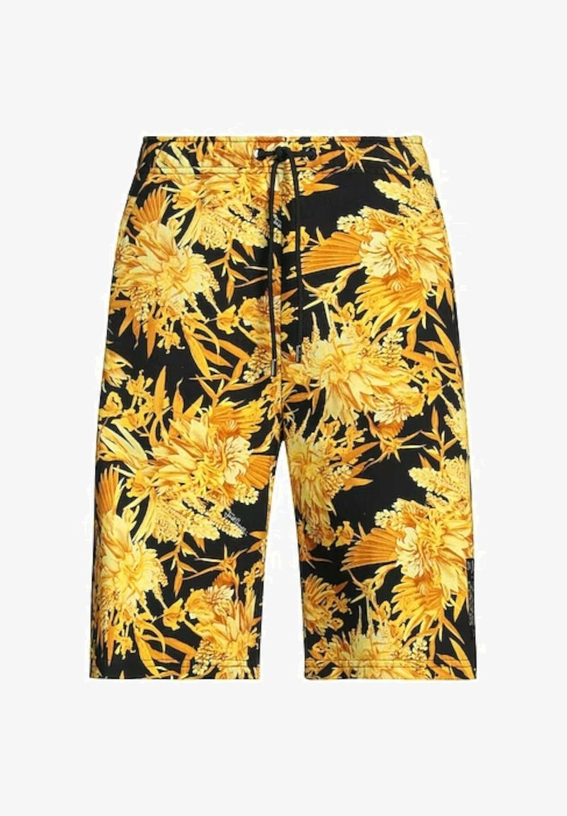 Pantalones cortos negros con un patrón floral amarillo brillante en toda la prenda y un cordón negro en la cintura.