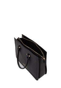 Borsa a mano nera in pelle con doppi manici, chiusura con zip in alto, accessori in tonalità oro e scomparti interni per l'organizzazione.