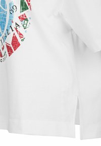 White cotton t-shirt featuring a colorful cracked graphic design in red, blue, and green, with slits on the sides for added detail.